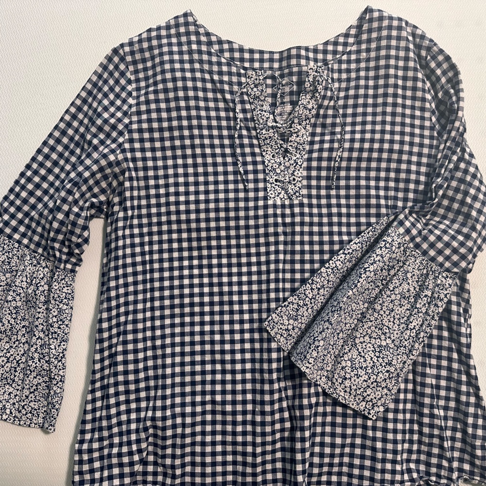St. John’s Bay three quarter sleeve shirt. Looks great with a pair of jeans.